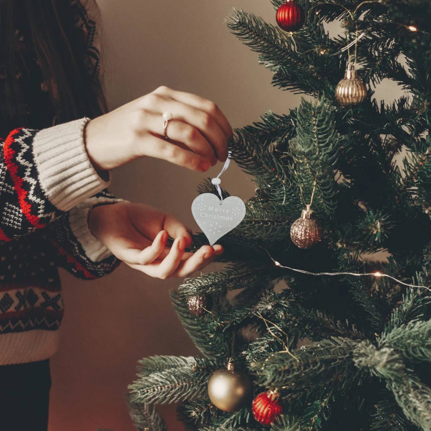Set of two heart-shaped wooden plaques with the phrase Merry Christmas, Christmas decoration, garland to hang on the tree, in the home, bathroom, kitchen, entrance door