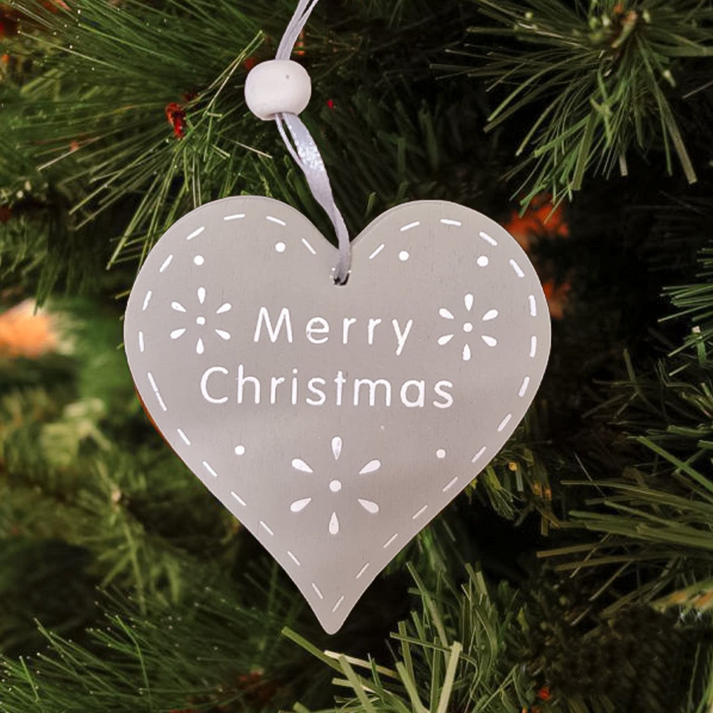 Set of two heart-shaped wooden plaques with the phrase Merry Christmas, Christmas decoration, garland to hang on the tree, in the home, bathroom, kitchen, entrance door