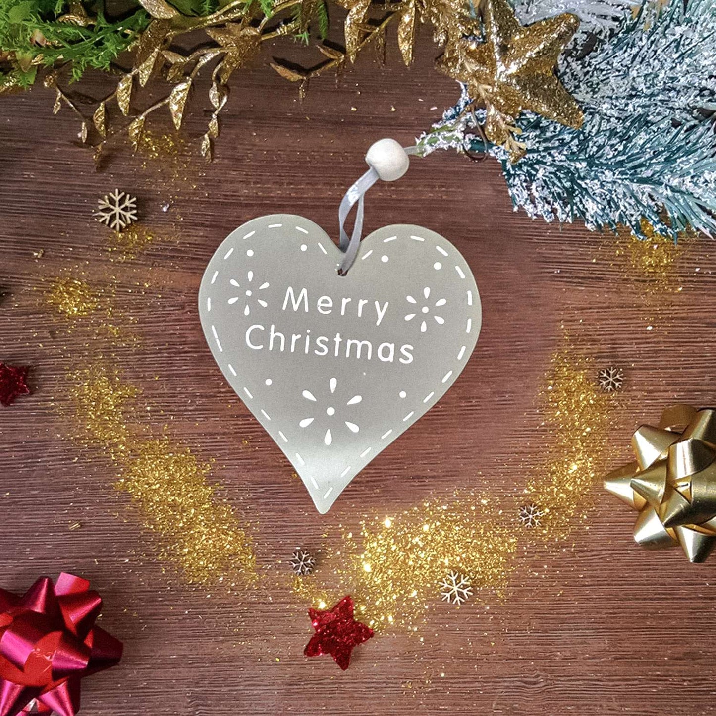 Set of two heart-shaped wooden plaques with the phrase Merry Christmas, Christmas decoration, garland to hang on the tree, in the home, bathroom, kitchen, entrance door